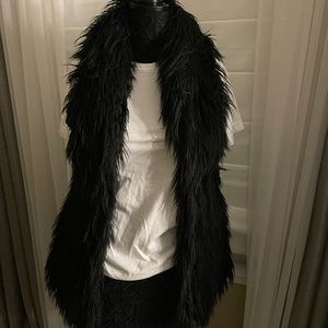 Black faux fur vest. Aqua size M